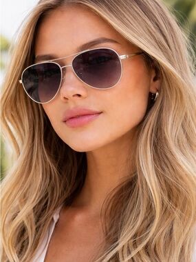 Longchamp Aviator Silver Frame Sunglasses with Gradient Gray Lenses